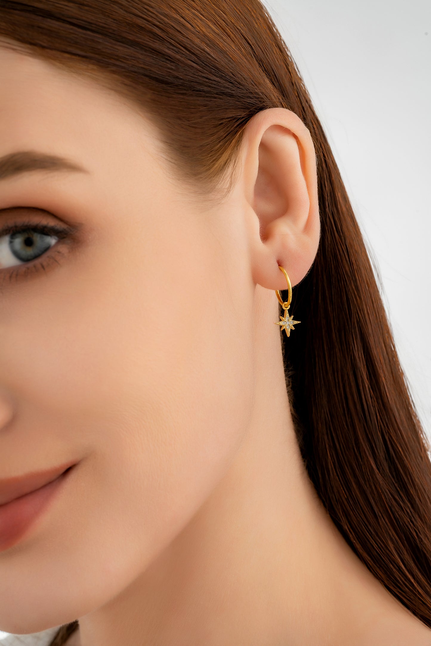 Gold Starburst Charm Earrings