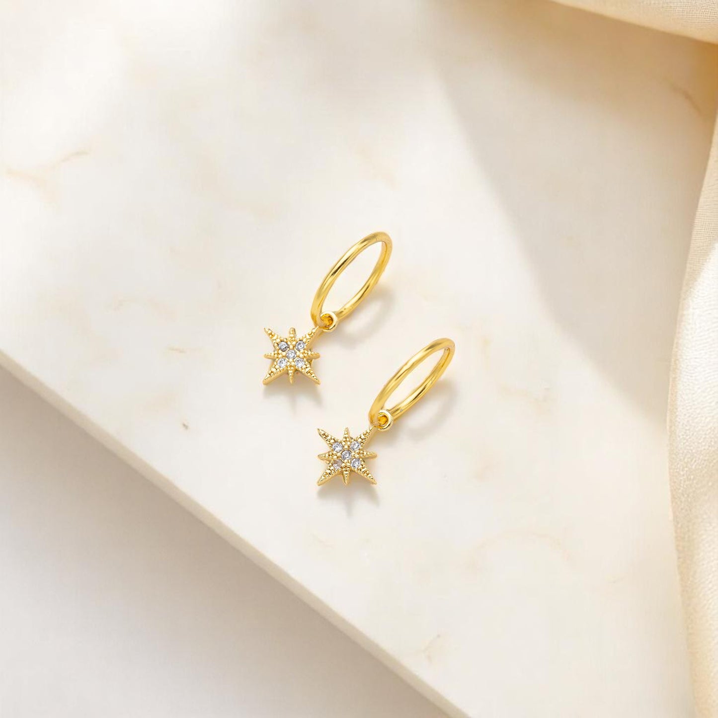 Gold Starburst Charm Earrings